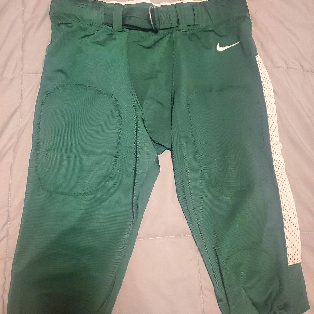 Nike football pants green